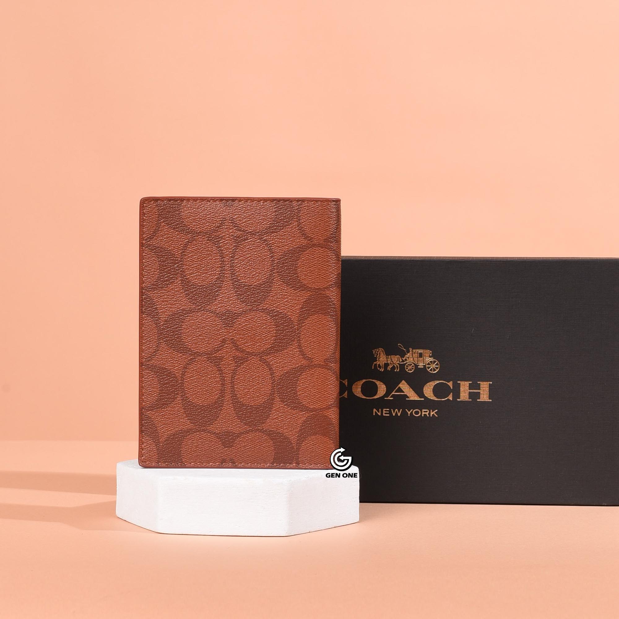 COACH 93518 SIGNATURE CANVAS PASSPORT WALLET - ORANGE