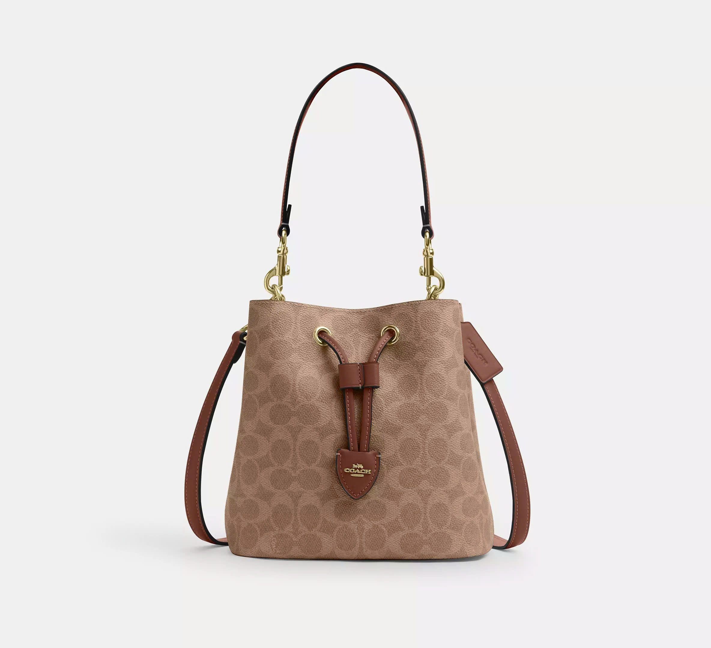 COACH CBH07 ROWAN BUCKET BAG IN SIGNATURE CANVAS - BROWN
