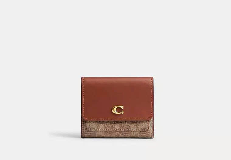 COACH CAT56 MILA SMALL FLAP WALLET IN SIGNATURE CANVAS - BROWN