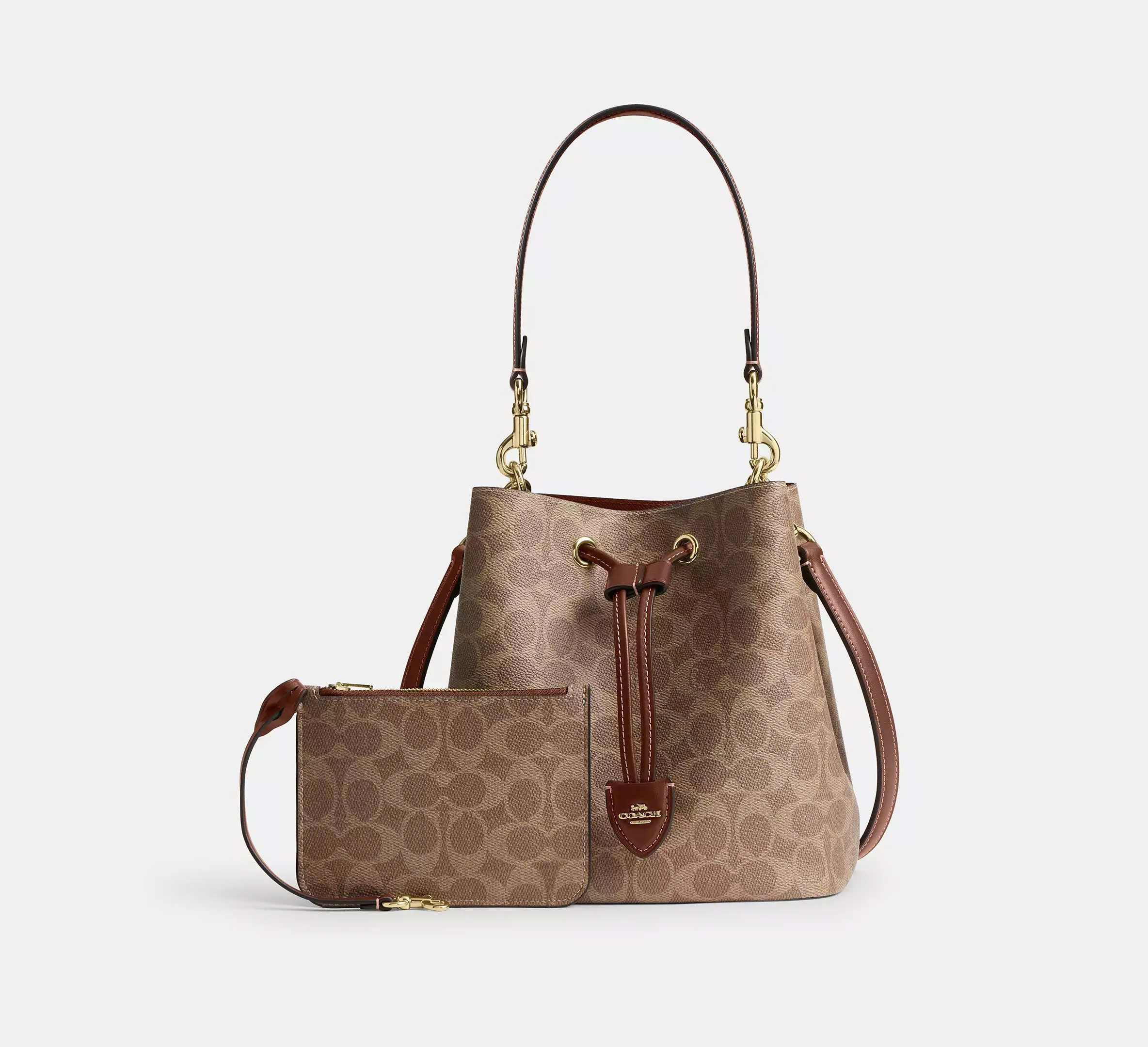 COACH CBH07 ROWAN BUCKET BAG IN SIGNATURE CANVAS - BROWN