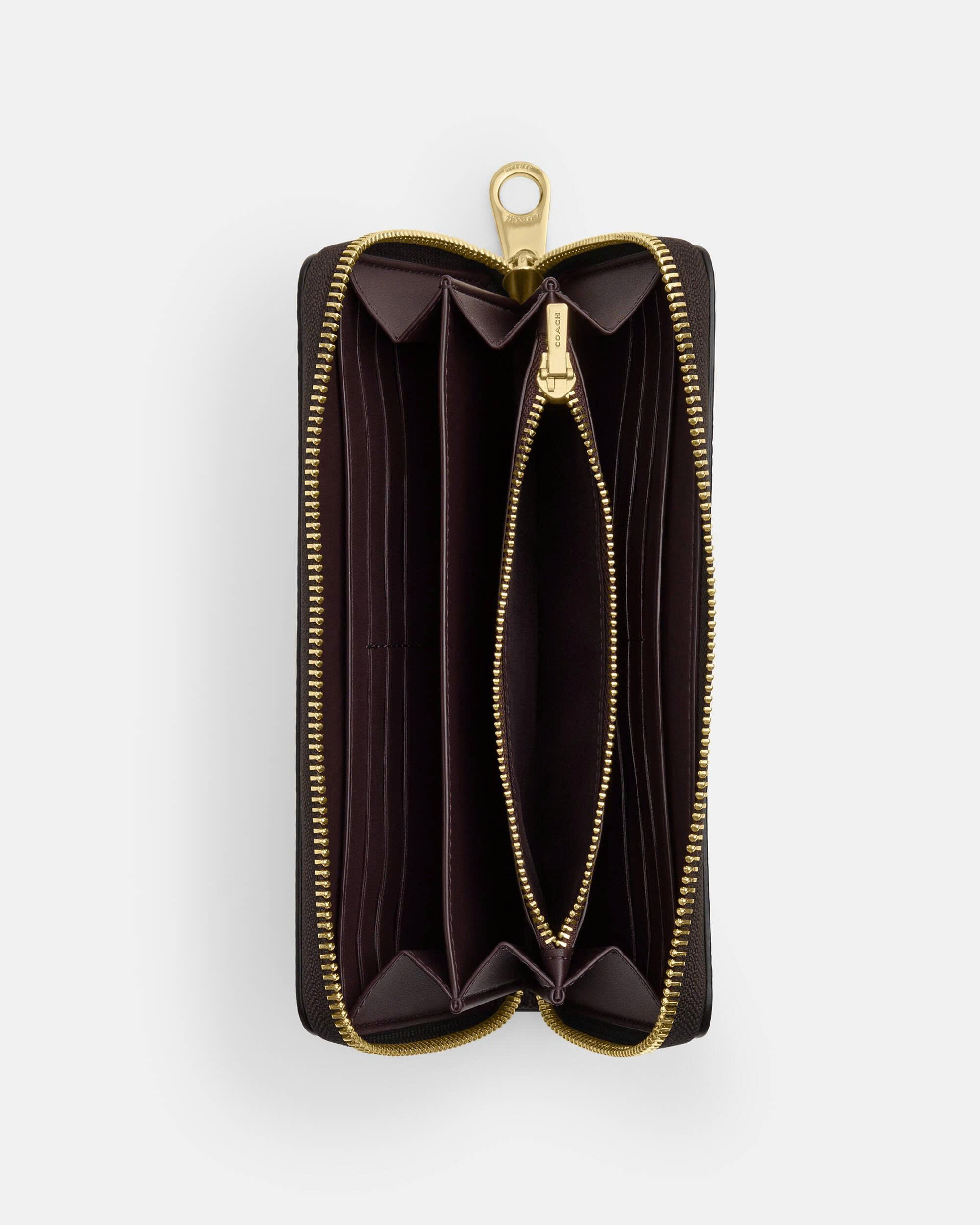 COACH CW778 LONG ZIP AROUND WALLET IN SIGNATURE CANVAS - DARK BROWN